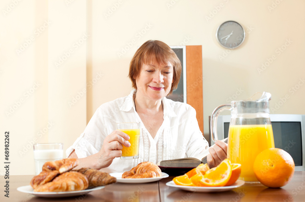  mature  woman having breakfast