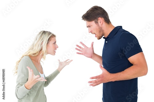 Angry couple facing off during argument