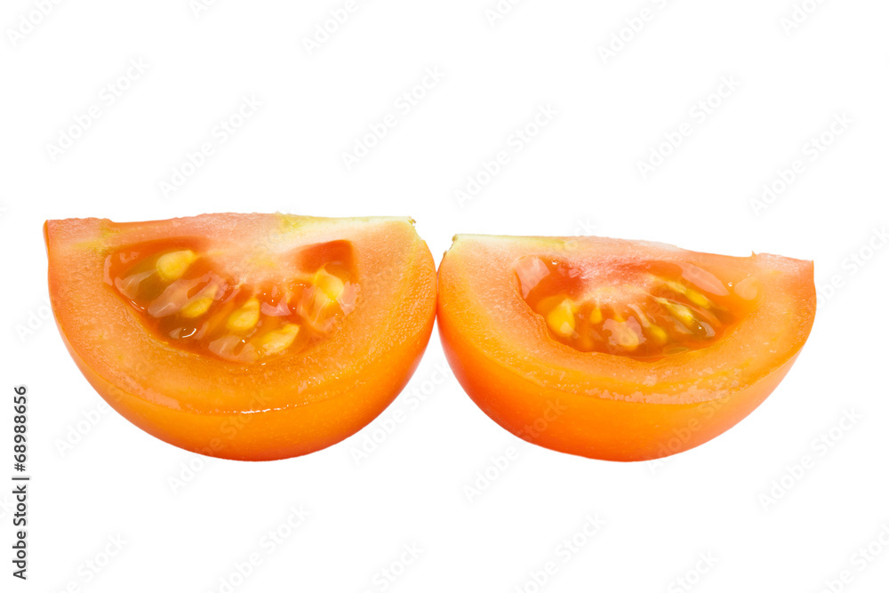 two slices yellow tomatoes isolated on white background
