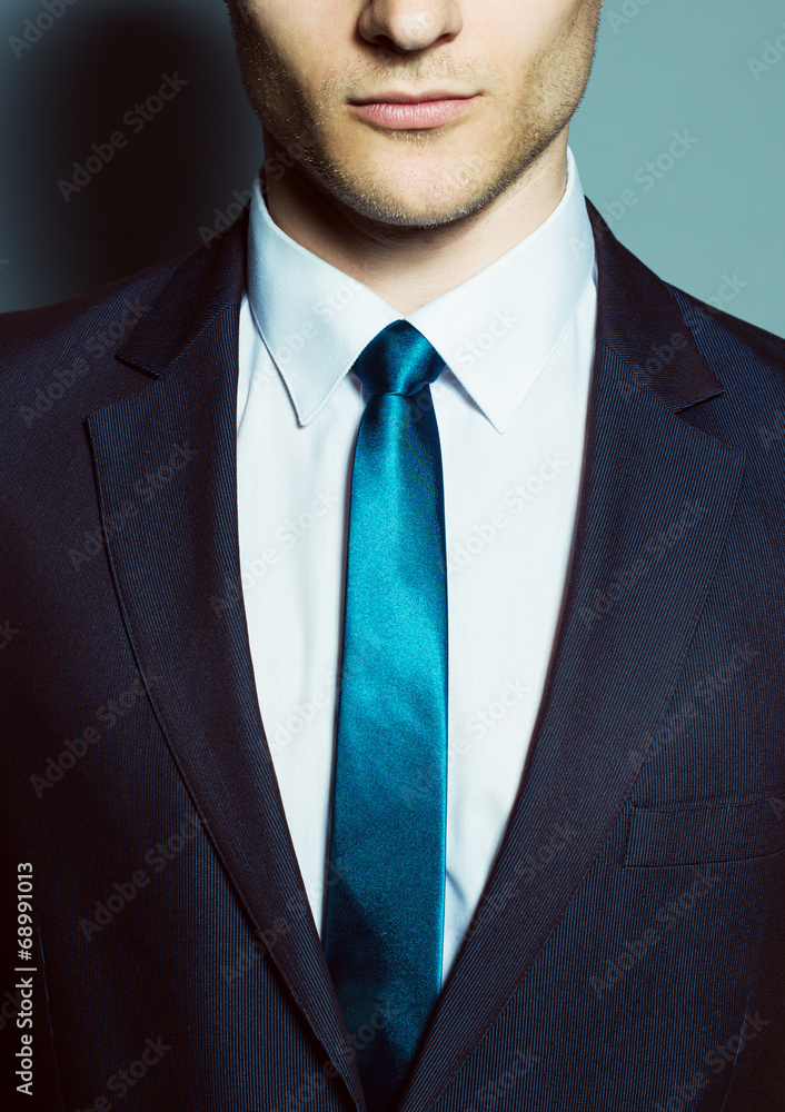 Portrait of a young handsome man (businessman) in classic suit, Portrait of a young handsome man (businessman) in classic suit,