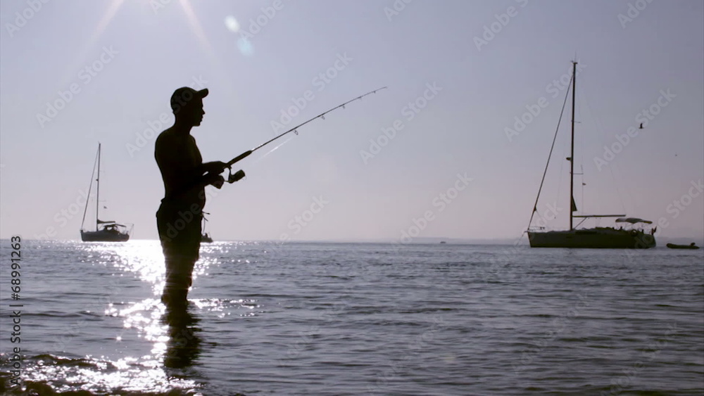 Fisherman silhouette at Ria Formosa, Algarve. Fisherman silhouette at Ria Formosa, Algarve.