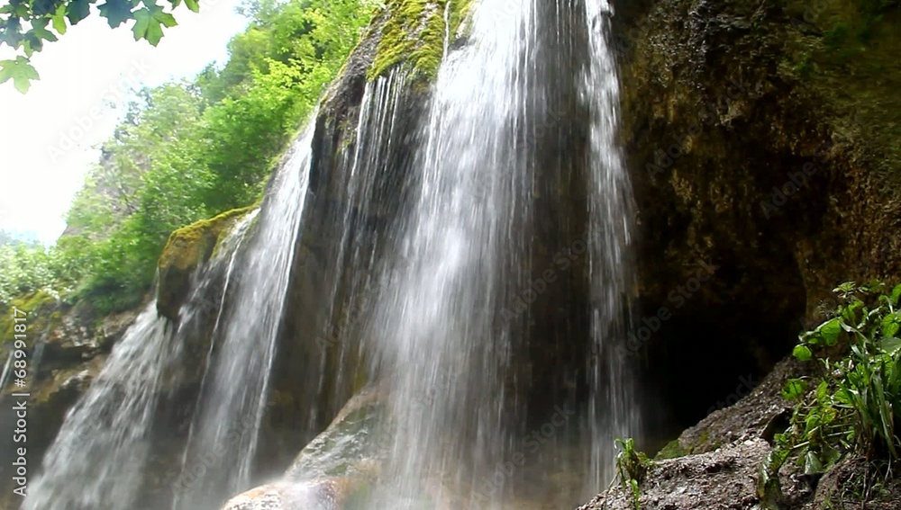 Beautiful waterfall falling off a cliff, Chegem Gorge Beautiful waterfall falling off a cliff, Chegem Gorge