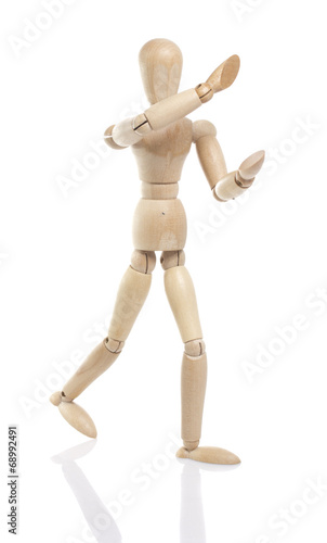 wooden dummy holding something