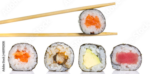 Little sushi maki roll with chopsticks isolated