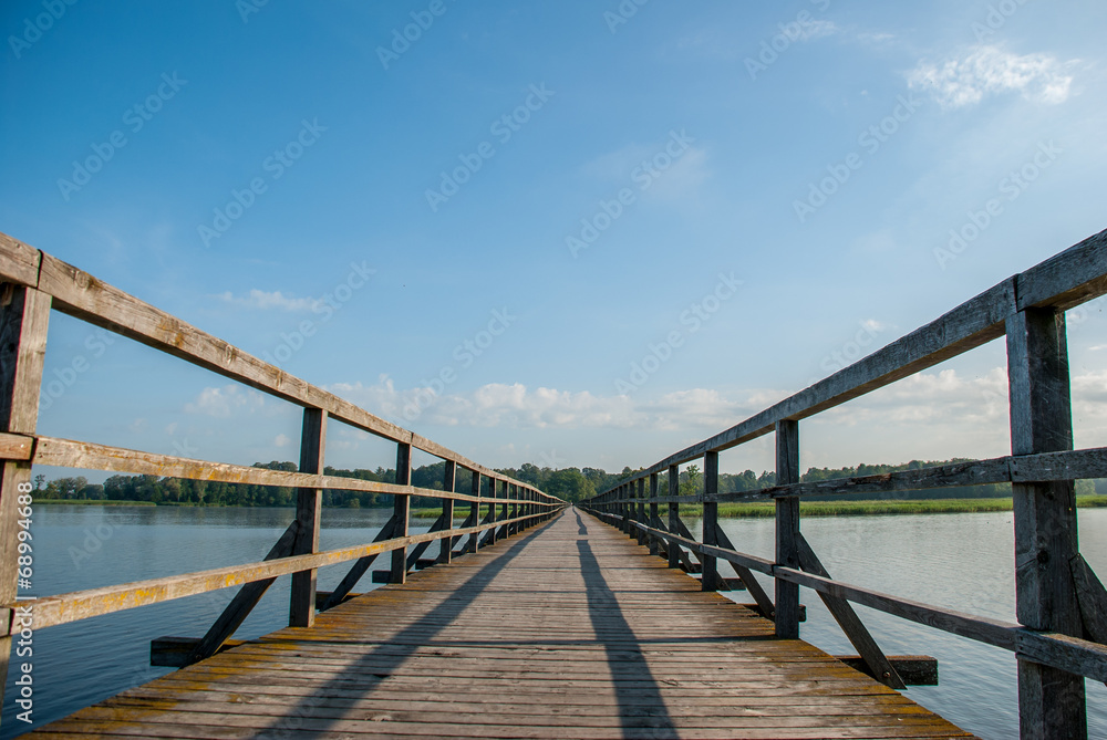 Fototapeta premium long bridge over the lake