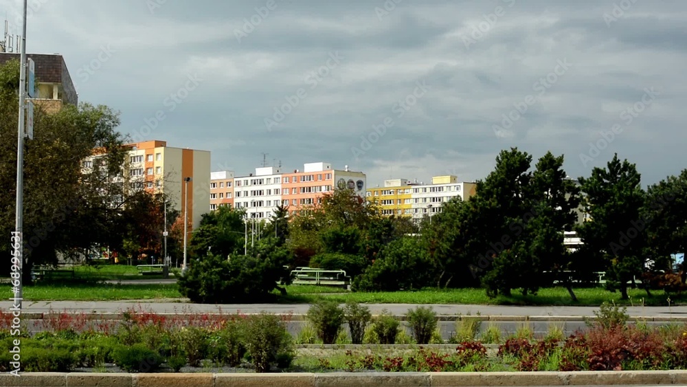 housing estate (flats) - road with passing cars - nature housing estate (flats) - road with passing cars - nature