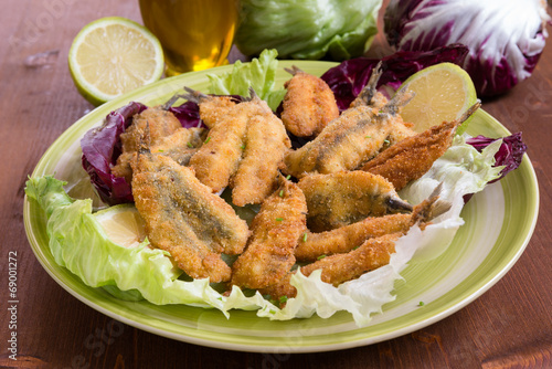 Sardine panate e fritte, fried and breaded sardines photo