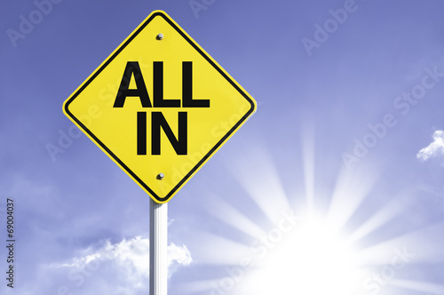 Fotografie All In road sign with sun background
