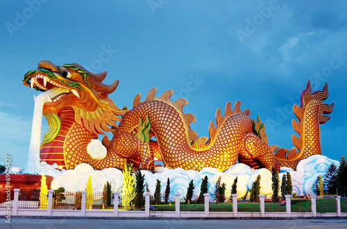  Big dragon statue at night, Supanburi Thailand © Beach boy 2024