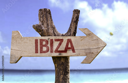 Ibiza sign with a beach on background