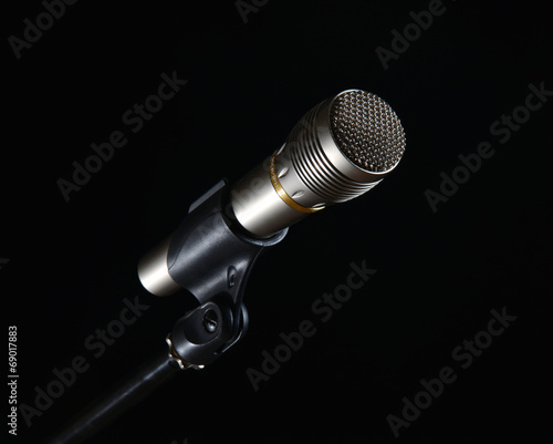 Microphone isolated on black background
