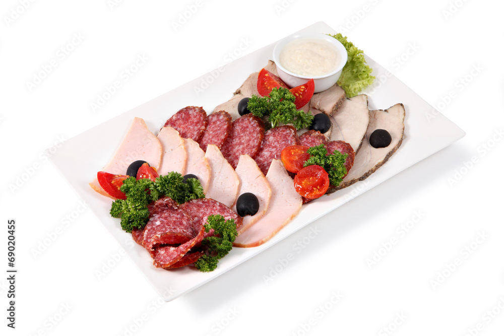 Cold cuts on plate, isolated over white background. Cold cuts on plate, isolated over white background.