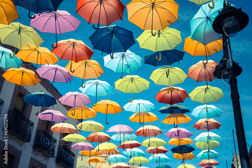 Obraz na płótnie Street decorated with colored umbrellas,Madrid w salonie