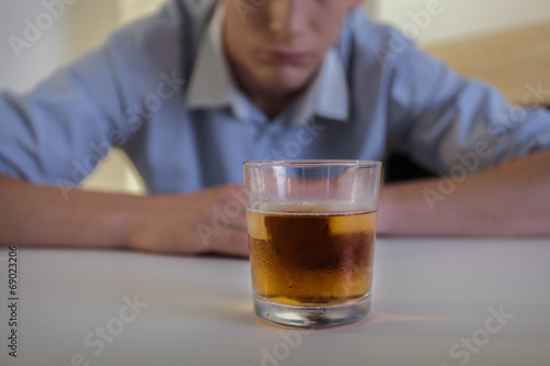 Man struggling with alcohol addiction
