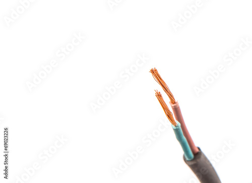 Exposed electrical wire over white background