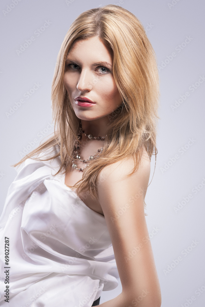 Beauty Concept: Close-up Studio Portrait of BeautifulBlond Woman