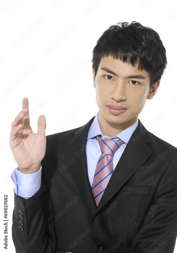 Handsome young business man happy smile point finger Handsome young business man happy smile point finger