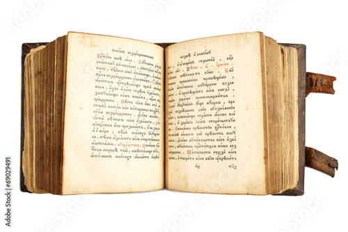 Foto Open old cyrillic book isolated on white