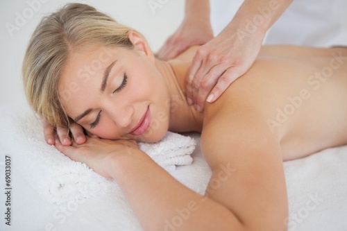 Pretty blonde enjoying a massage