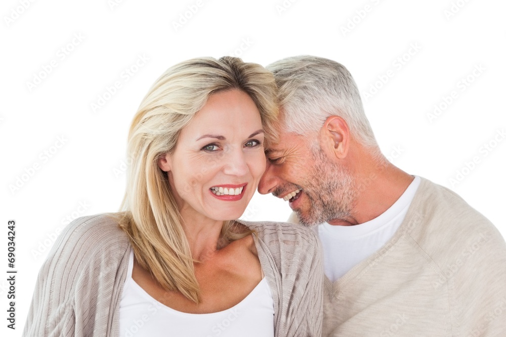 Happy couple laughing together woman looking at camera Happy couple laughing together woman looking at camera