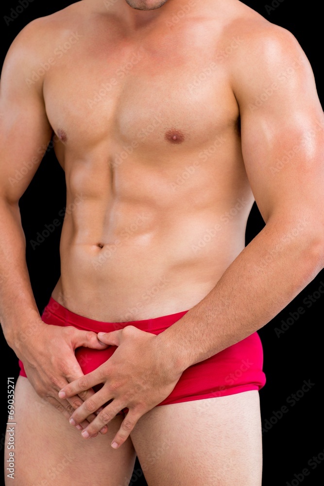 © WavebreakmediaMicro - Close-up mid section of a shirtless muscular man
