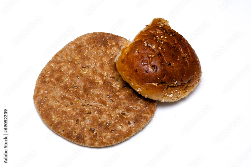 multi grain flat bread with roll on white multi grain flat bread with roll on white