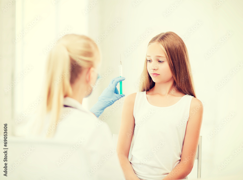 doctor doing vaccine to child in hospital doctor doing vaccine to child in hospital