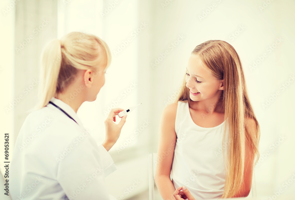 doctor with child measuring temperature doctor with child measuring temperature