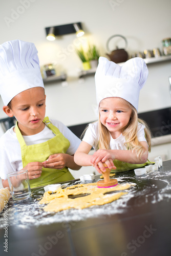 happy childrens kids family preparing funny cake kitchen at home