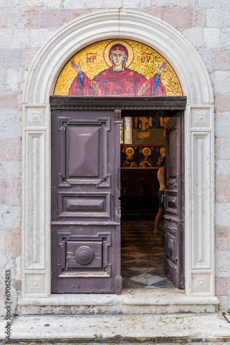 Mosaic orthodox icon above the door in Montenegro © rogkoff