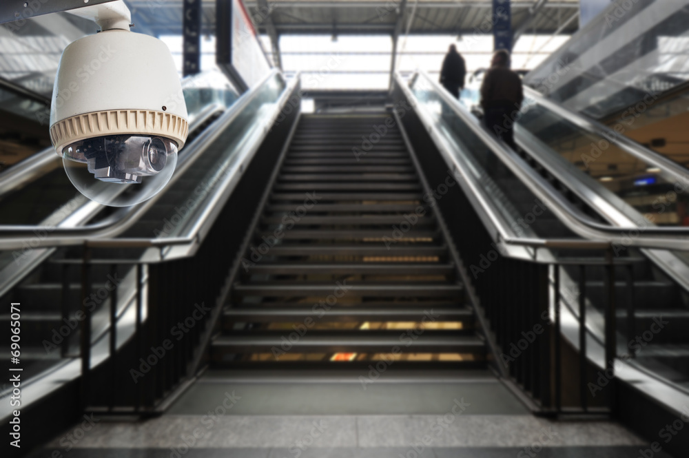 Fototapeta premium CCTV Camera Operating on escalator