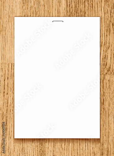 Vector blank paper A4 sheet on wooden background.