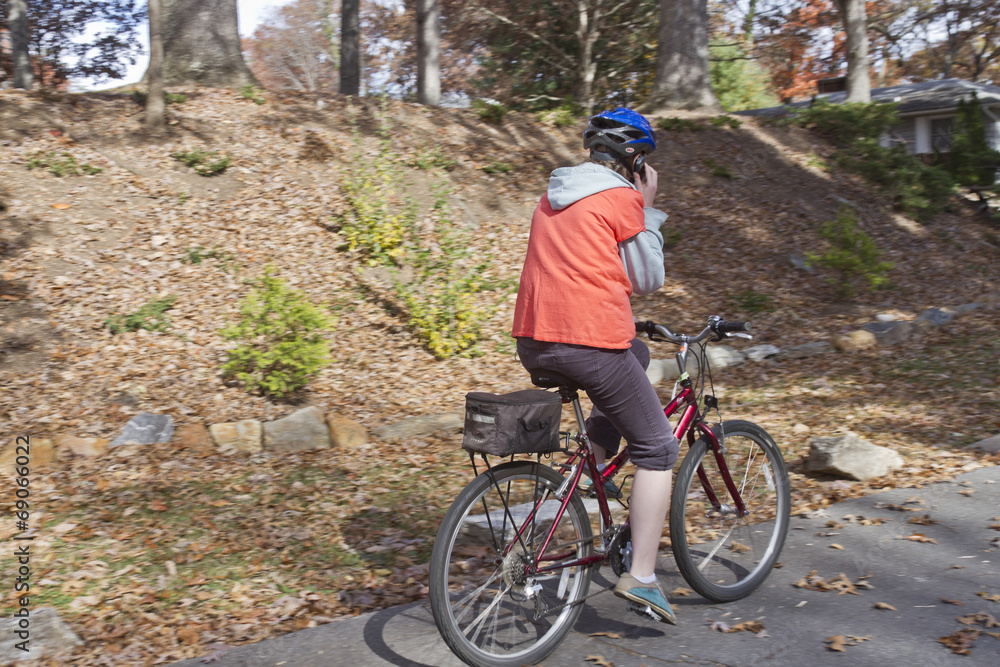 Using a Cell Phone While Riding a Bike Using a Cell Phone While Riding a Bike