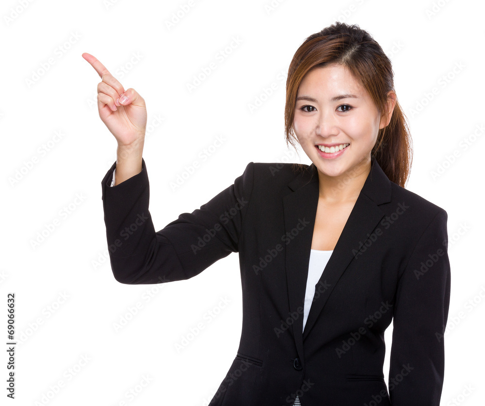 Businesswoman with finger point aside Businesswoman with finger point aside