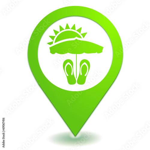 vacances à la plage sur symbole localisation vert