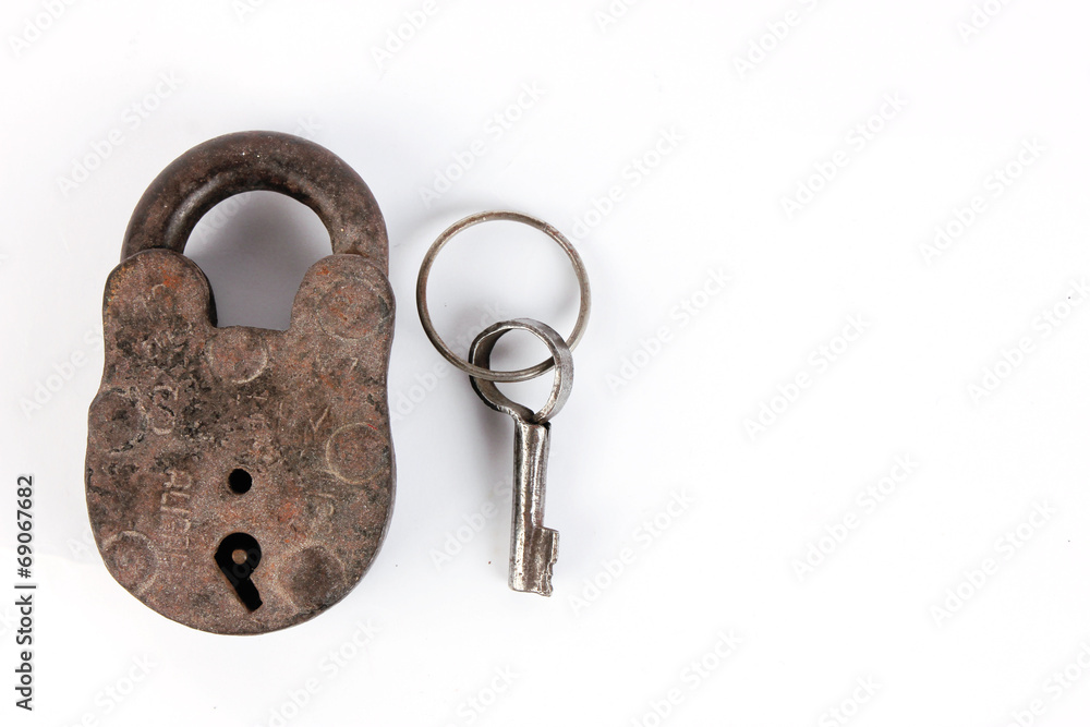 Old padlock and key. Isolated with clipping path Old padlock and key. Isolated with clipping path