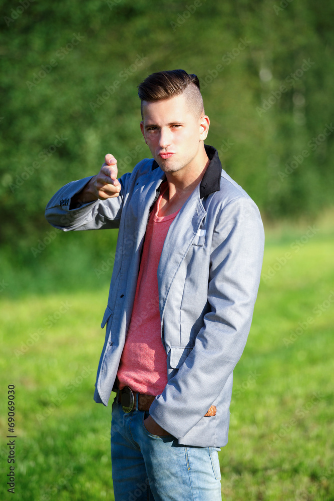 Fototapeta premium Fashion portrait of handsome young man