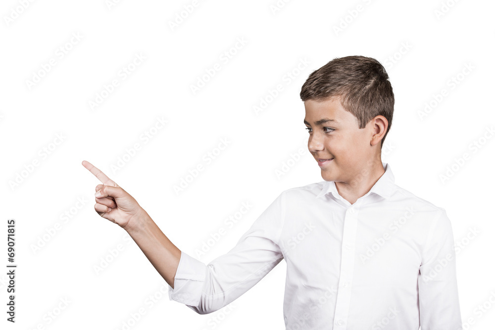 Happy teenager pointing at blank copy space white background Happy teenager pointing at blank copy space white background
