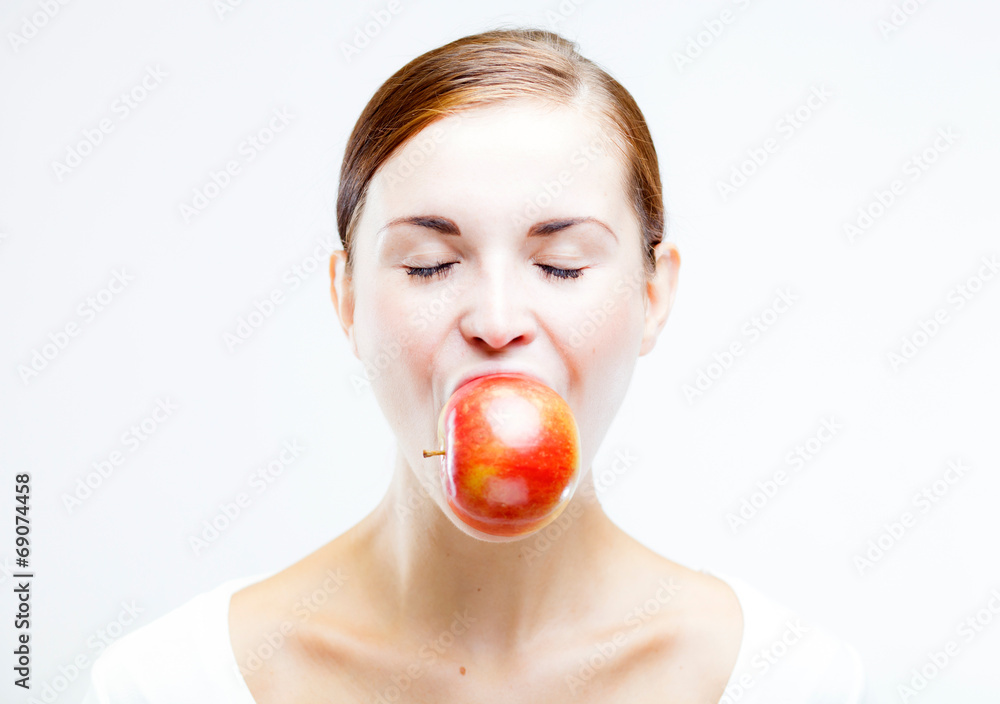 Woman eating red apple, fresh and healthy food Woman eating red apple, fresh and healthy food