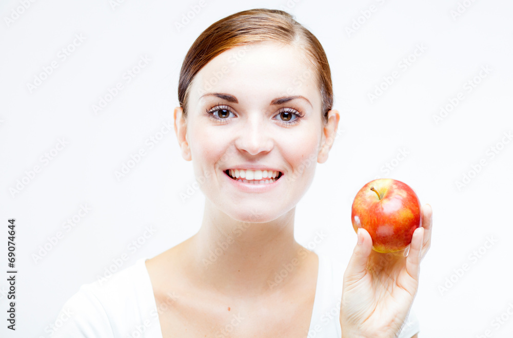 Woman holding and eating red apple, Healthy teeth Woman holding and eating red apple, Healthy teeth