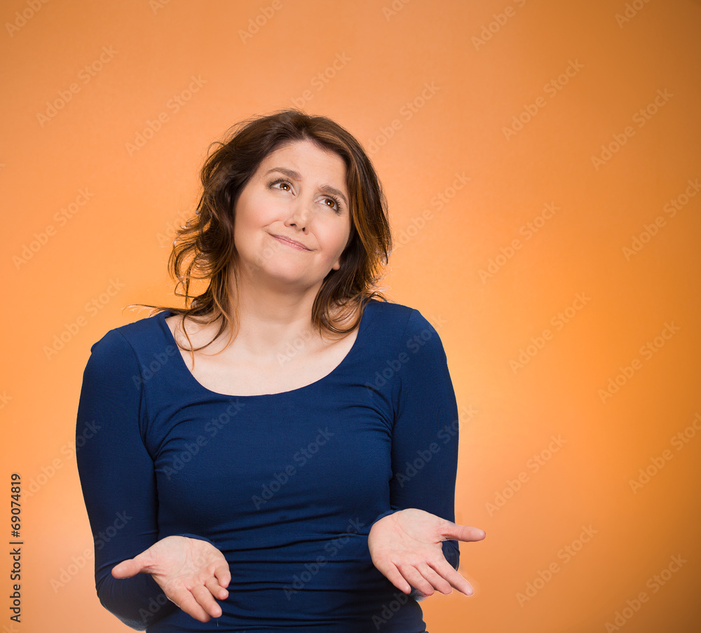 Clueless dumb woman looking up shrugs shoulders confused Clueless dumb woman looking up shrugs shoulders confused
