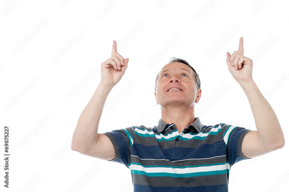 Caucasian man pointing up his fingers Caucasian man pointing up his fingers