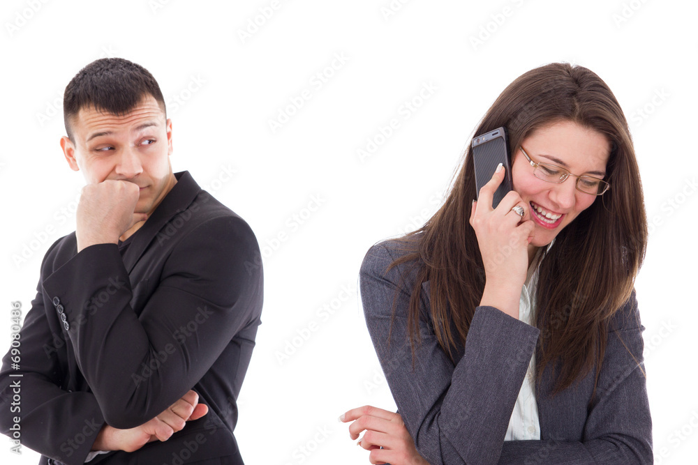 suspicious man looking at his woman talking on the phone suspicious man looking at his woman talking on the phone