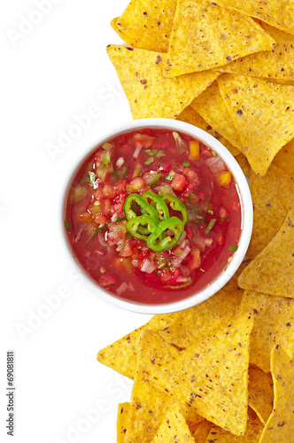 nachos and fresh salsa dip on white background