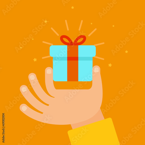 Vector hand giving present in flat style