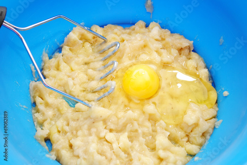 Slika na platnu Mashed Bananas with a Raw Egg on Top