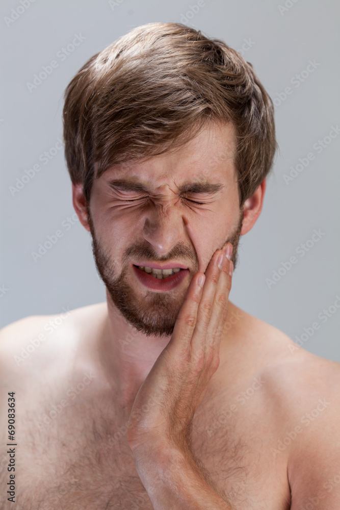 Obraz premium Man suffering from toothache