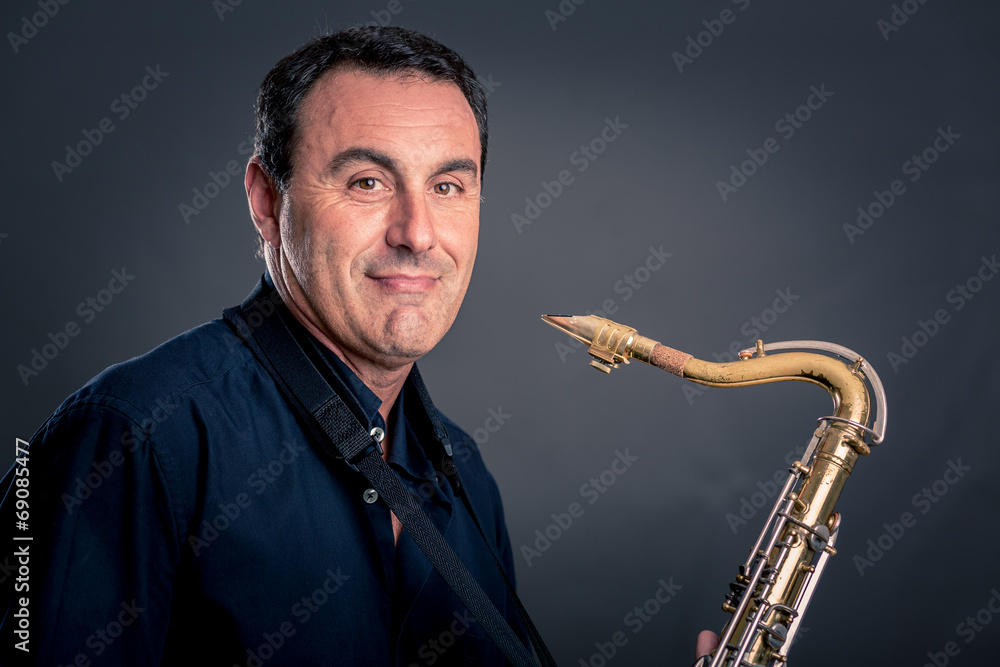 Naklejka premium musician with saxophone