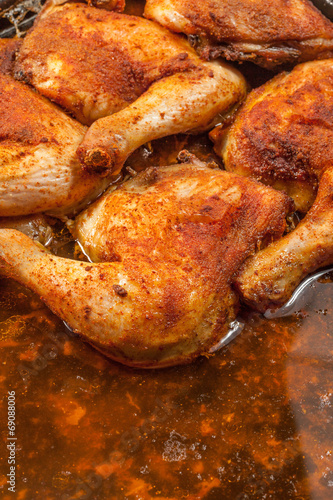 Fried chicken legs in deep fat. Selective focus.