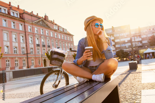 Young stylish woman in a city street